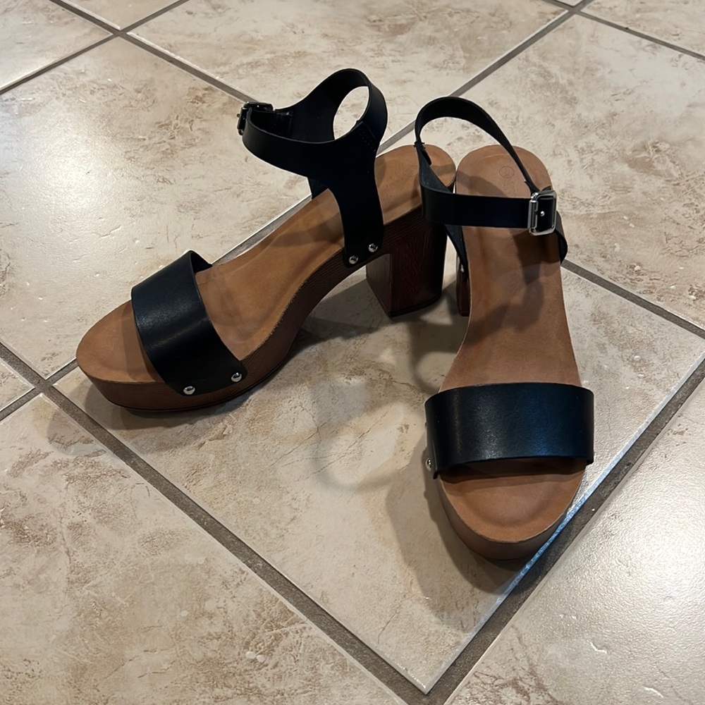 Brown clog heels with black straps